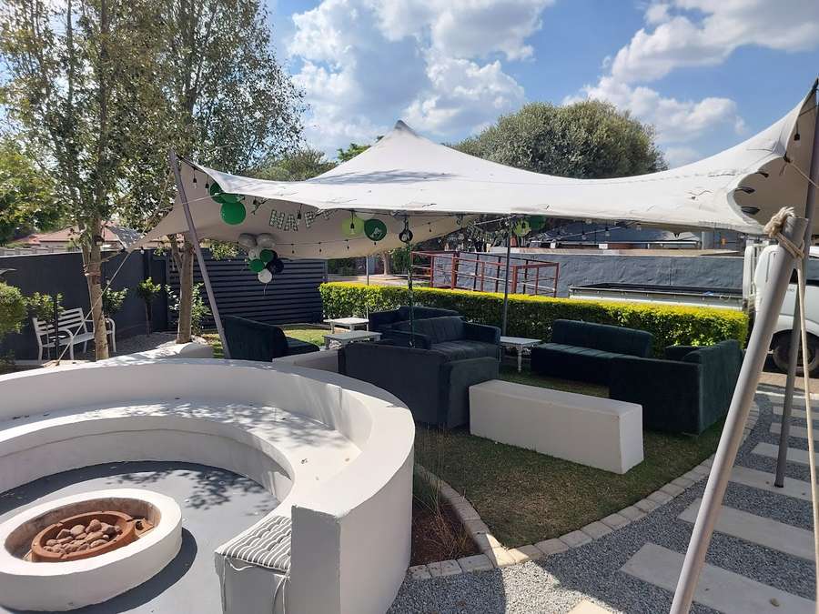Birthday stretch tent lounge setup